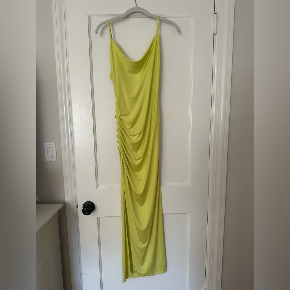 Neon yellow NBD dress with ruching and slit. Size small.